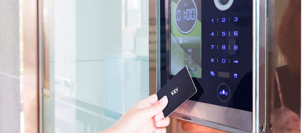 Touchless technology a contactless key is used to open a modern door